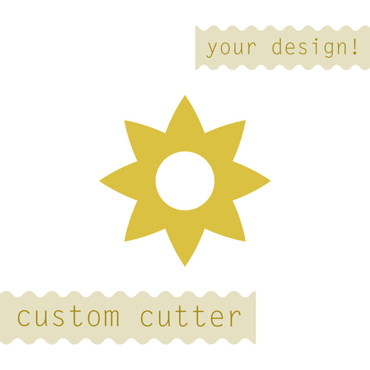 bright yellow sun design in the center with flower cutout your design custom cutter text written across the top and custom cutter text across the bottom in a squiggly banner